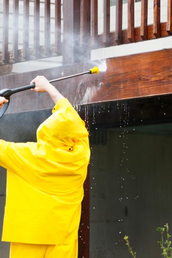 Person Washing Home Exterior